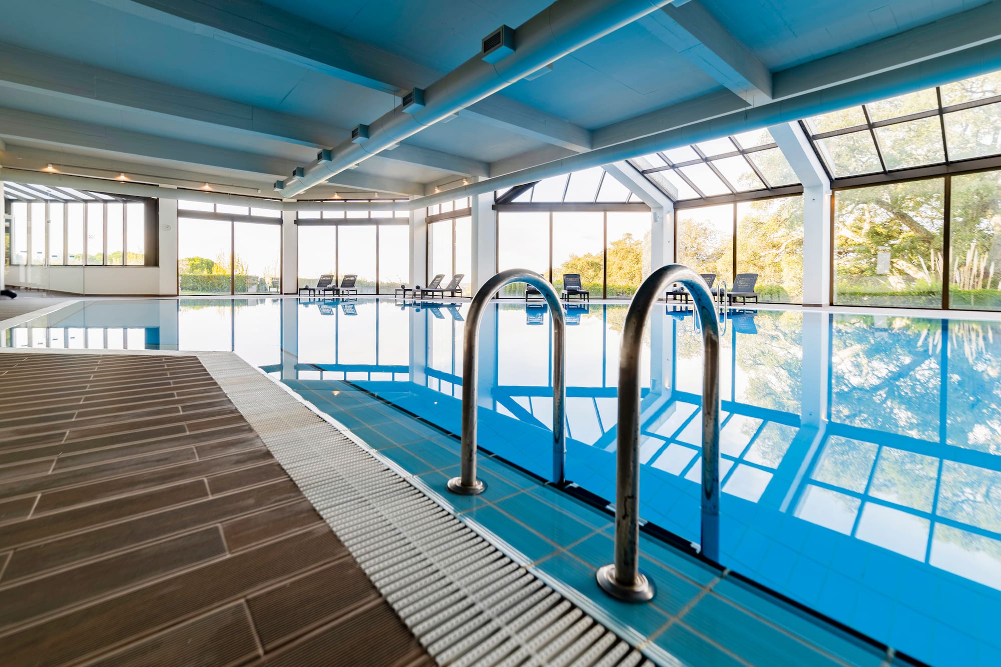 a swimming pool with a large window