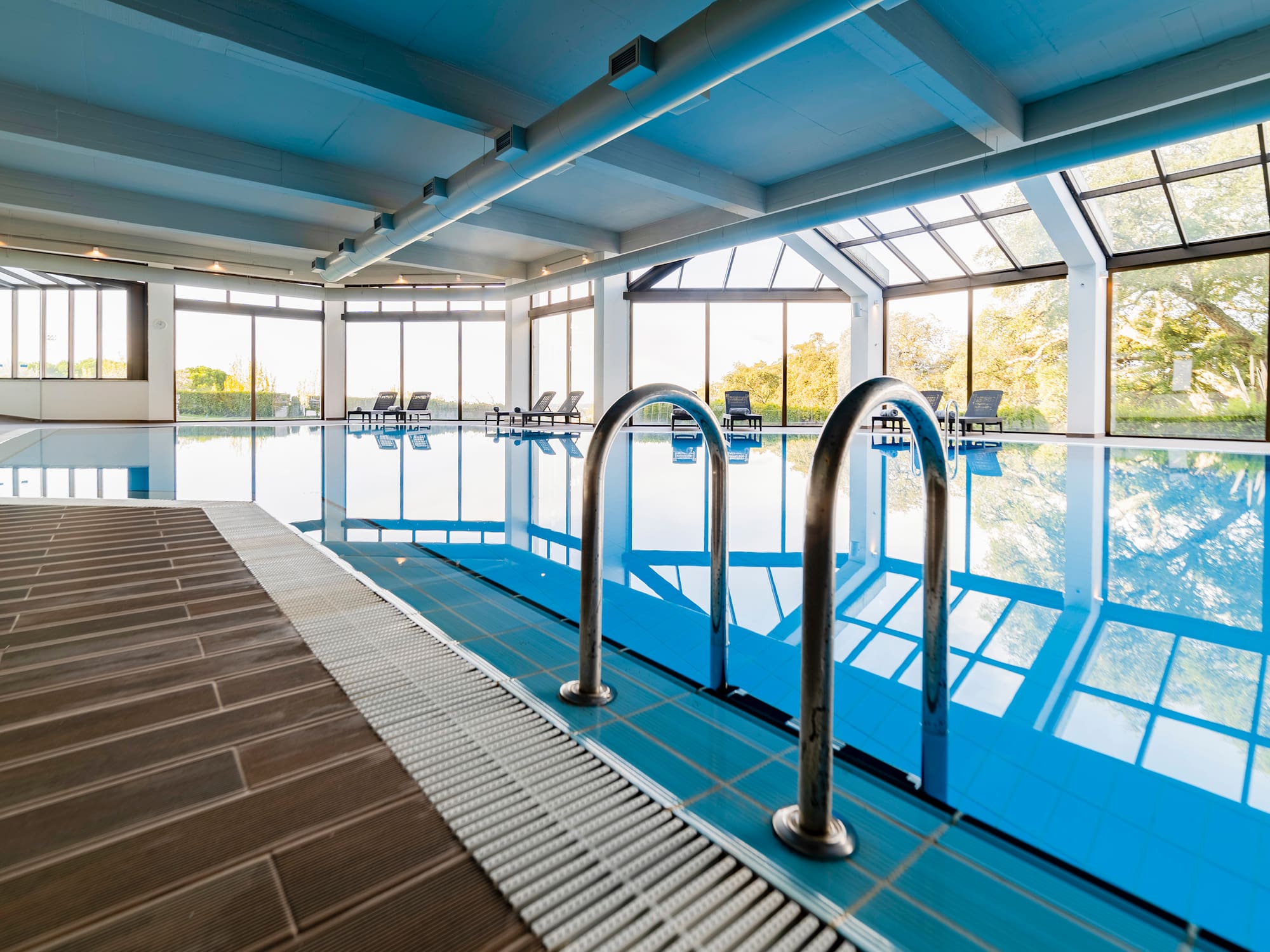 a swimming pool with a large window