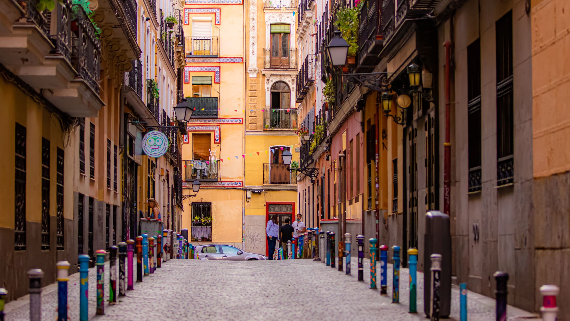 a street with buildings and cars