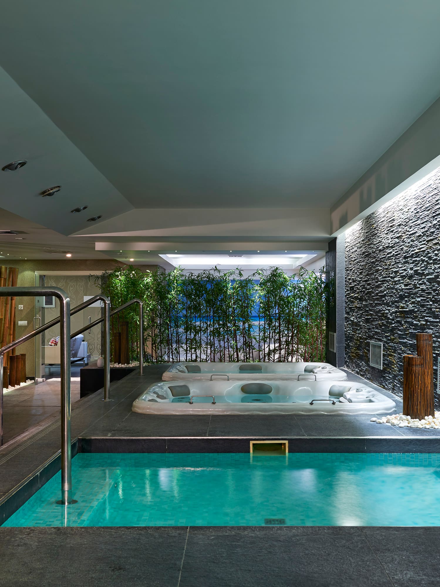 a indoor jacuzzi with a hot tub