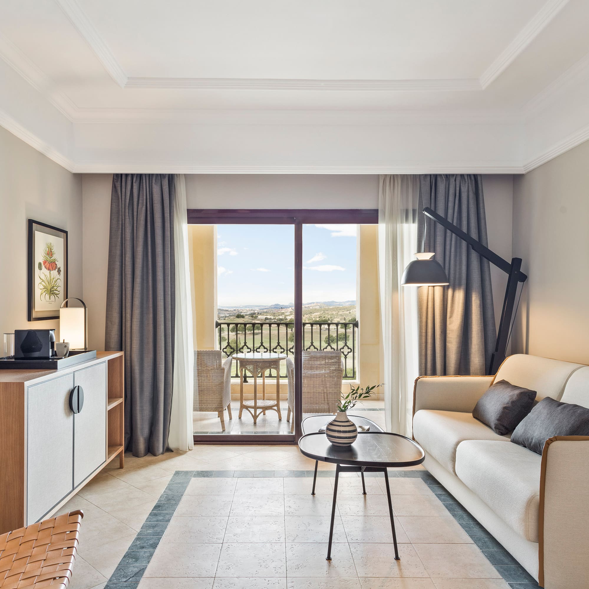 a living room with a couch and a table