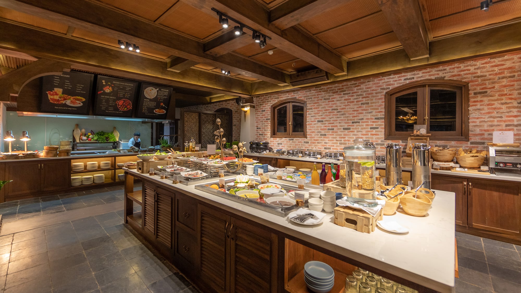 a large kitchen with food on the counter