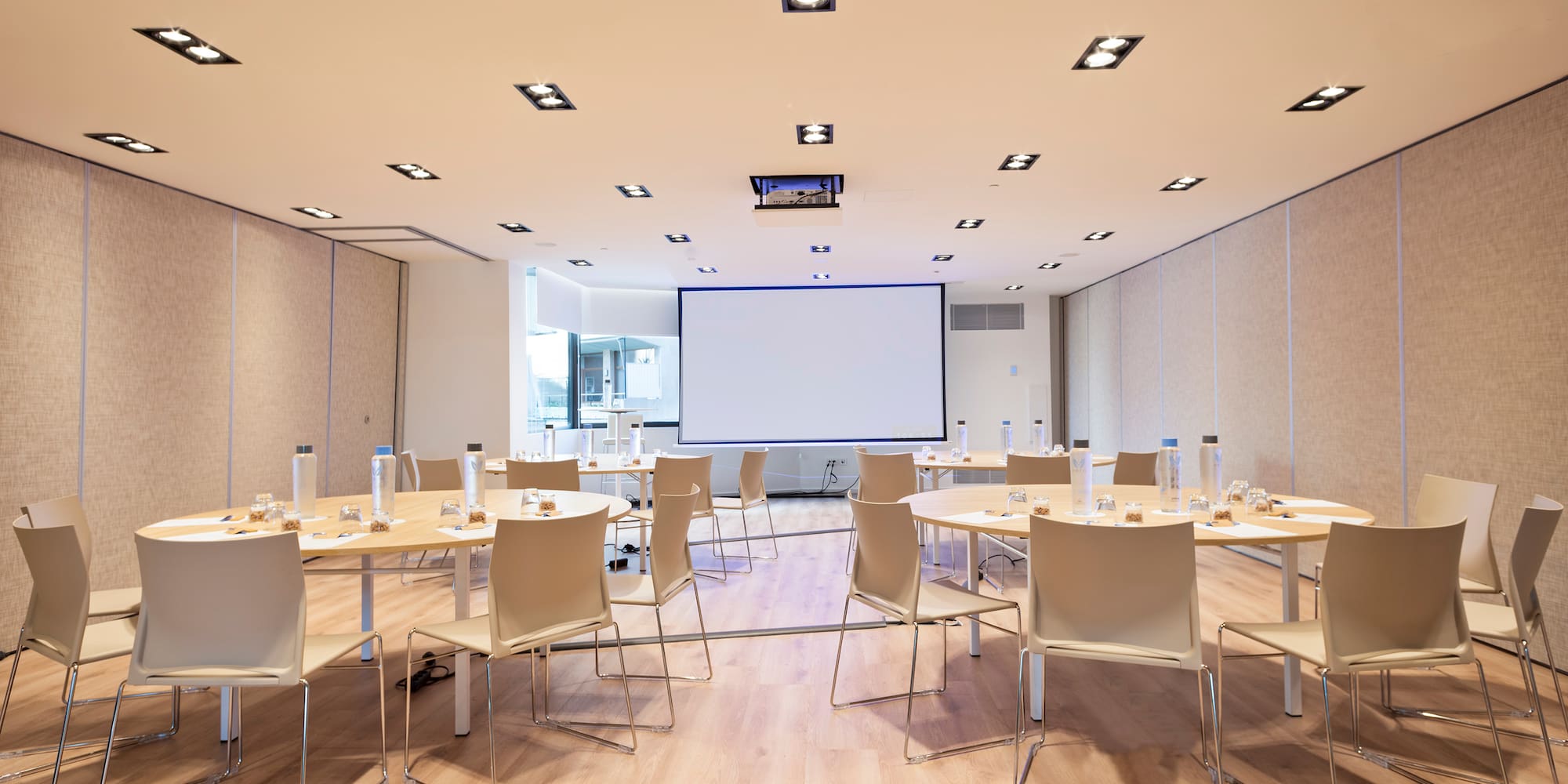 a room with tables and chairs