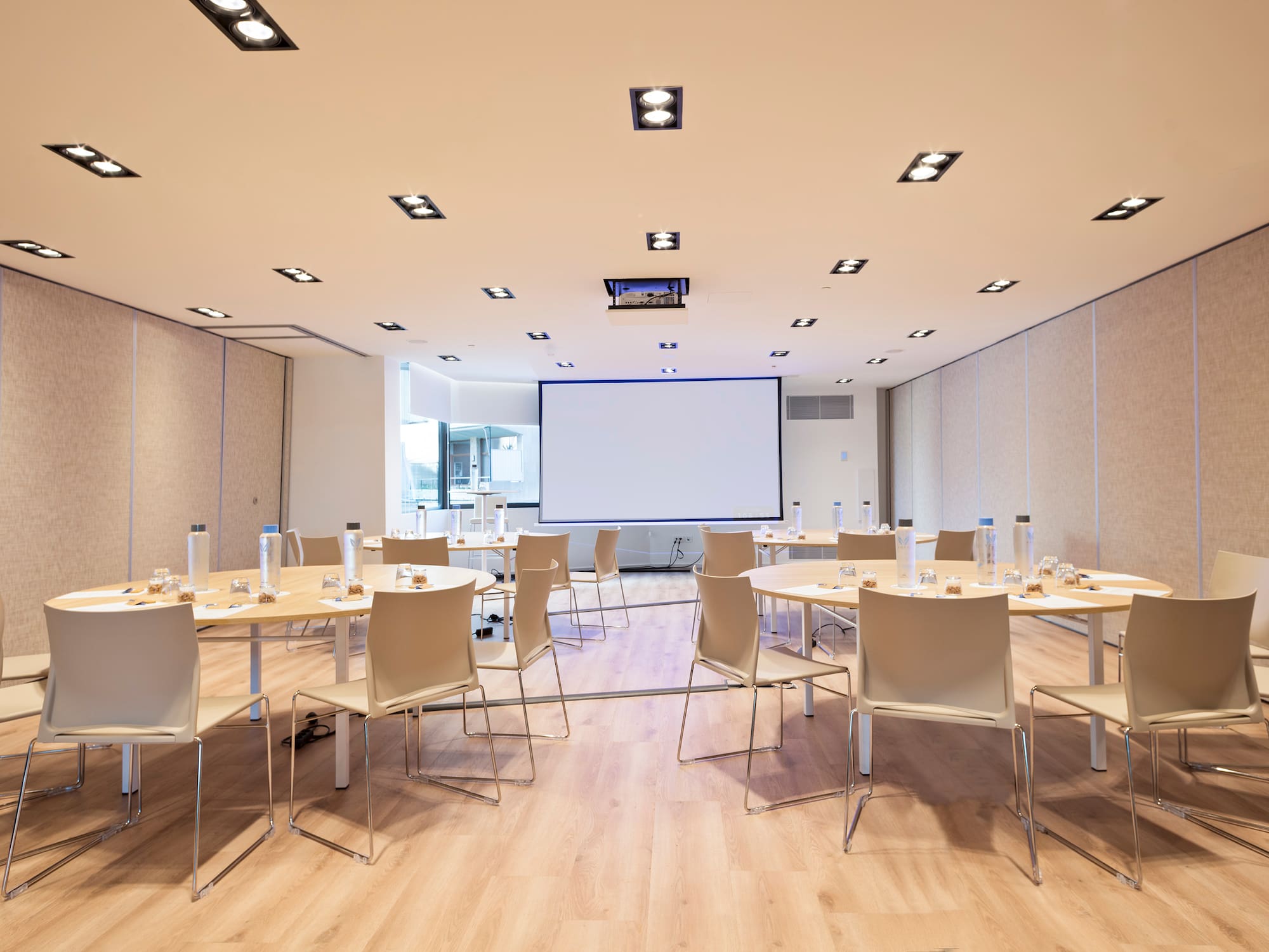 a room with tables and chairs