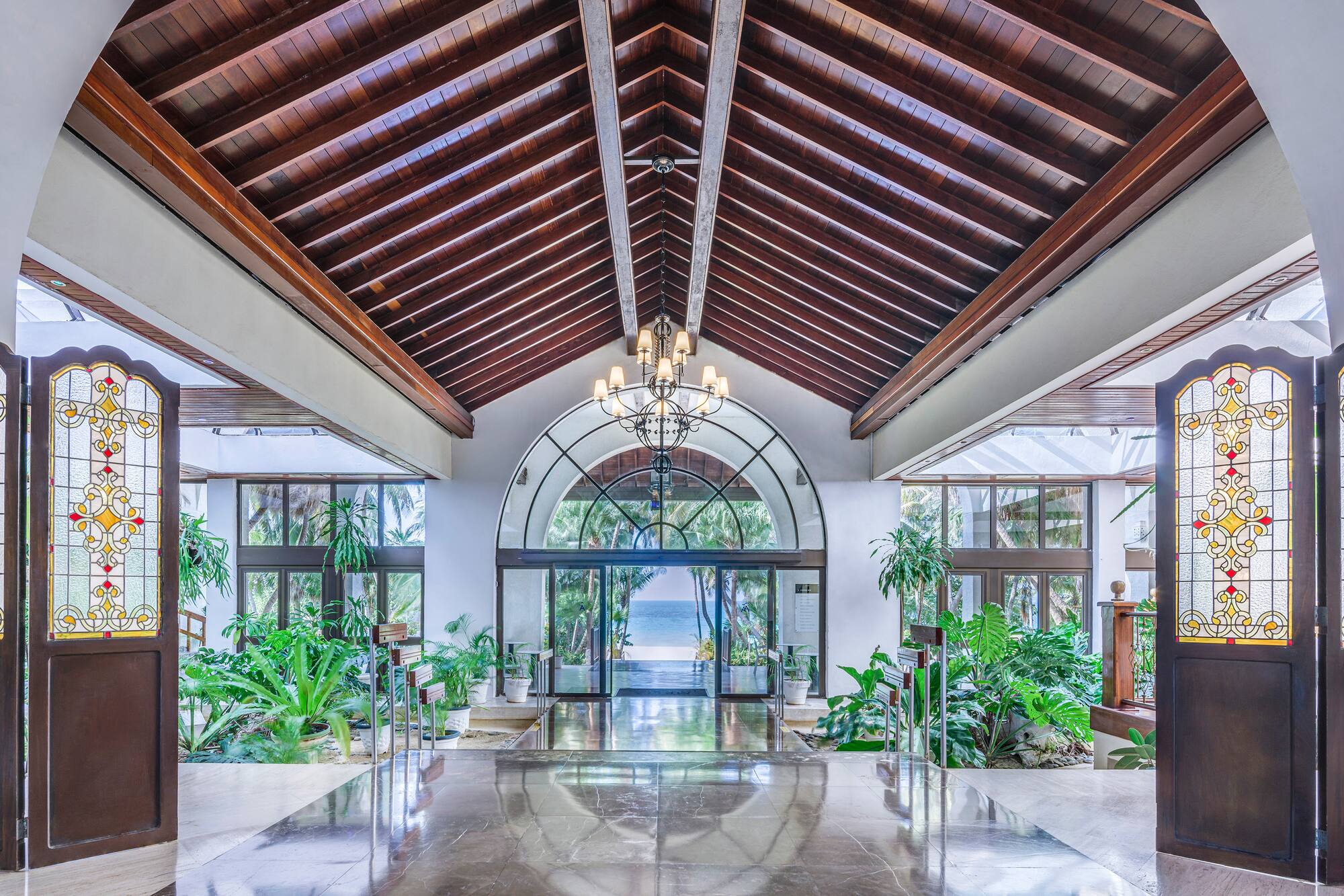 a large building with a glass ceiling and a chandelier