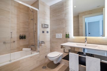 a bathroom with a sink and toilet