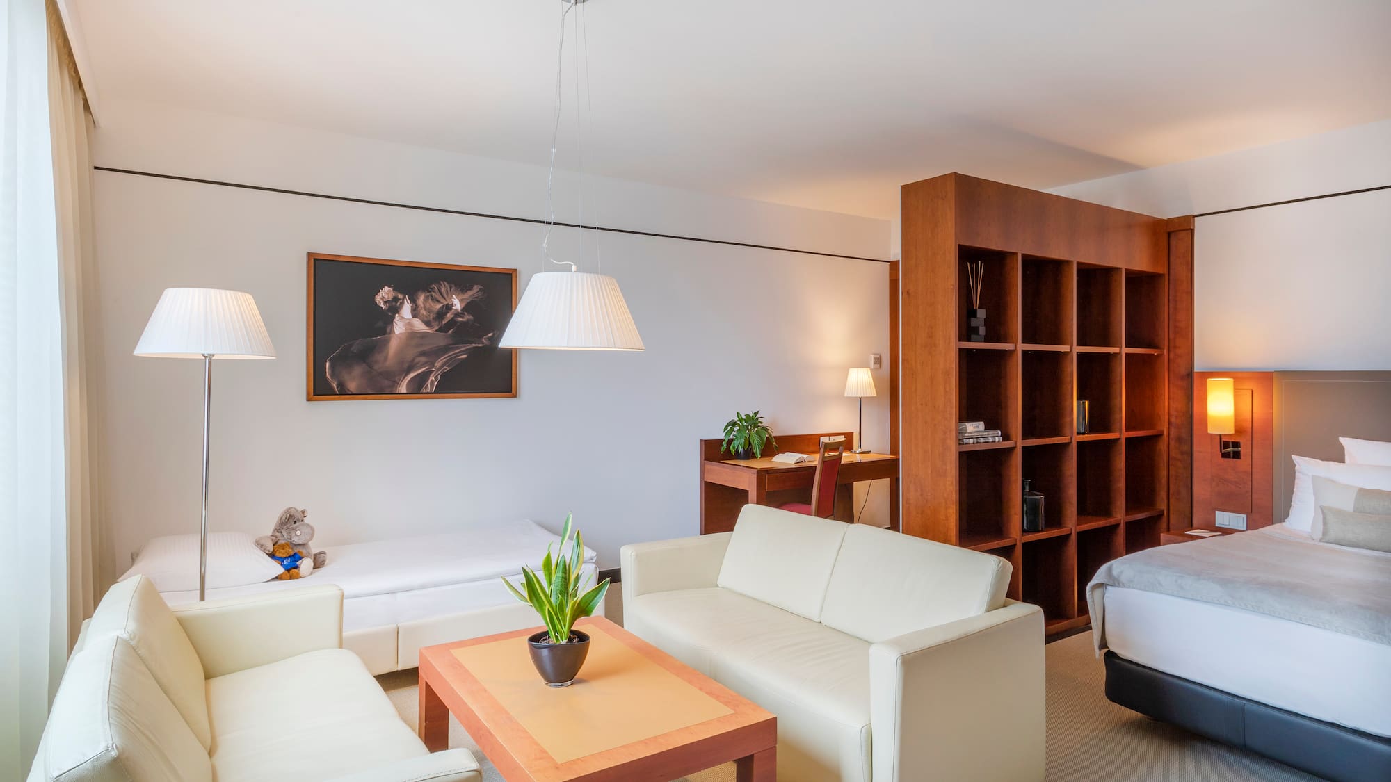 a room with a bed and a couch