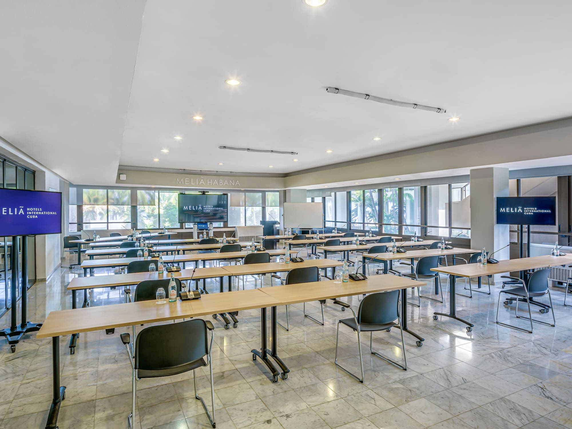 a room with tables and chairs
