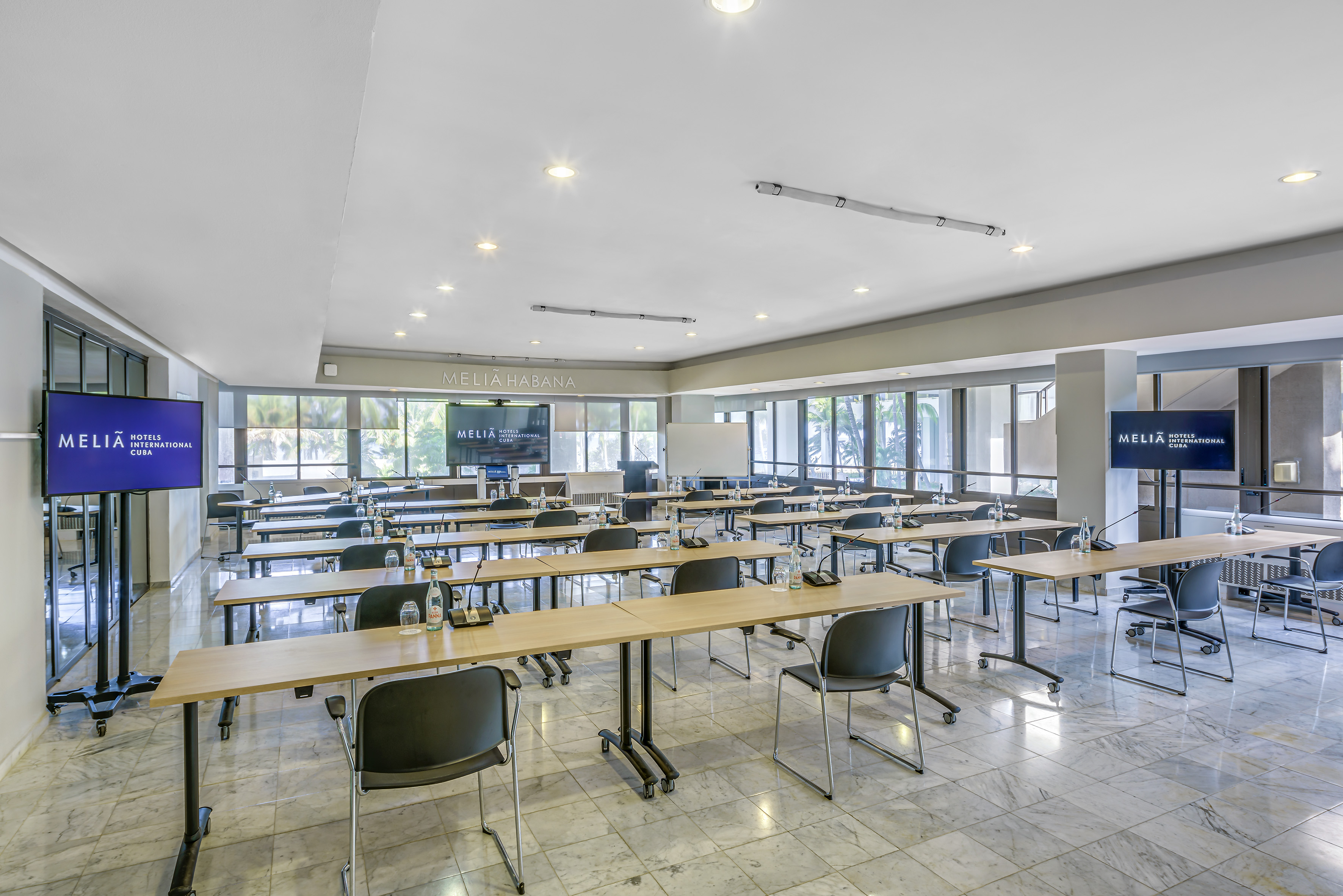 a room with tables and chairs
