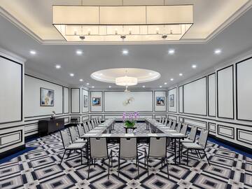 a room with a table and chairs
