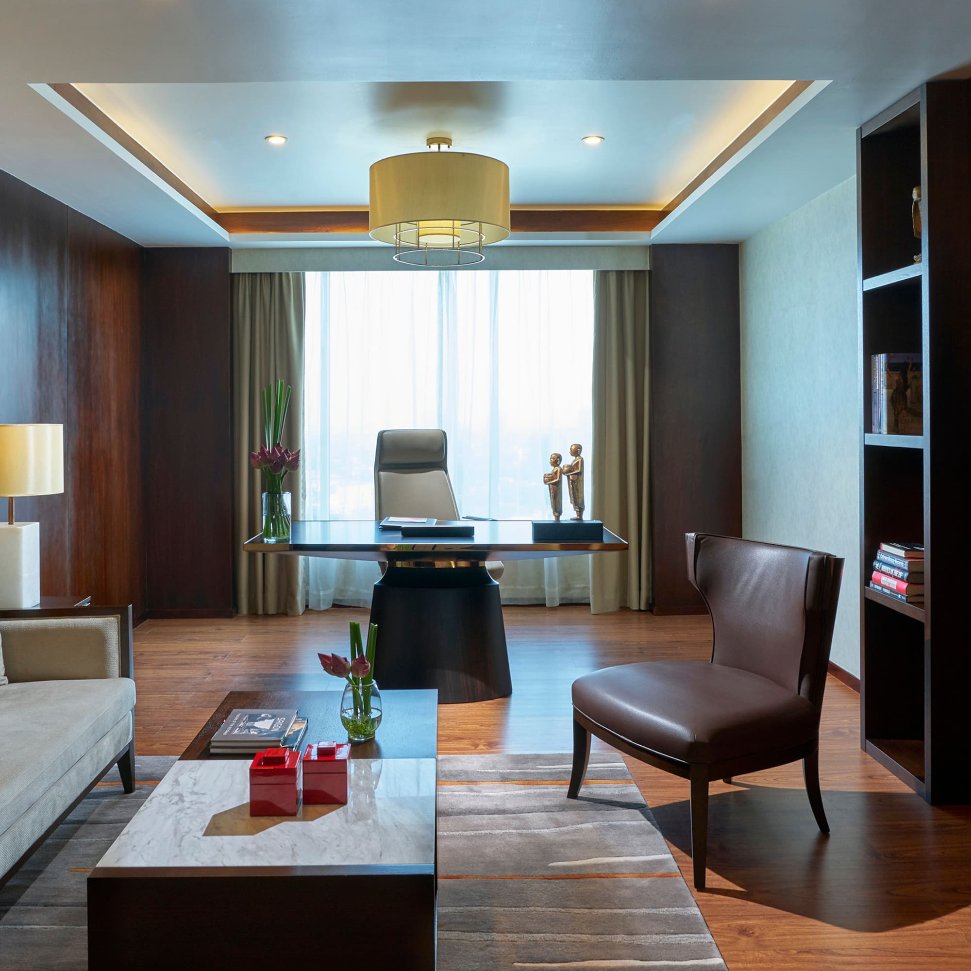 a room with a desk and couch