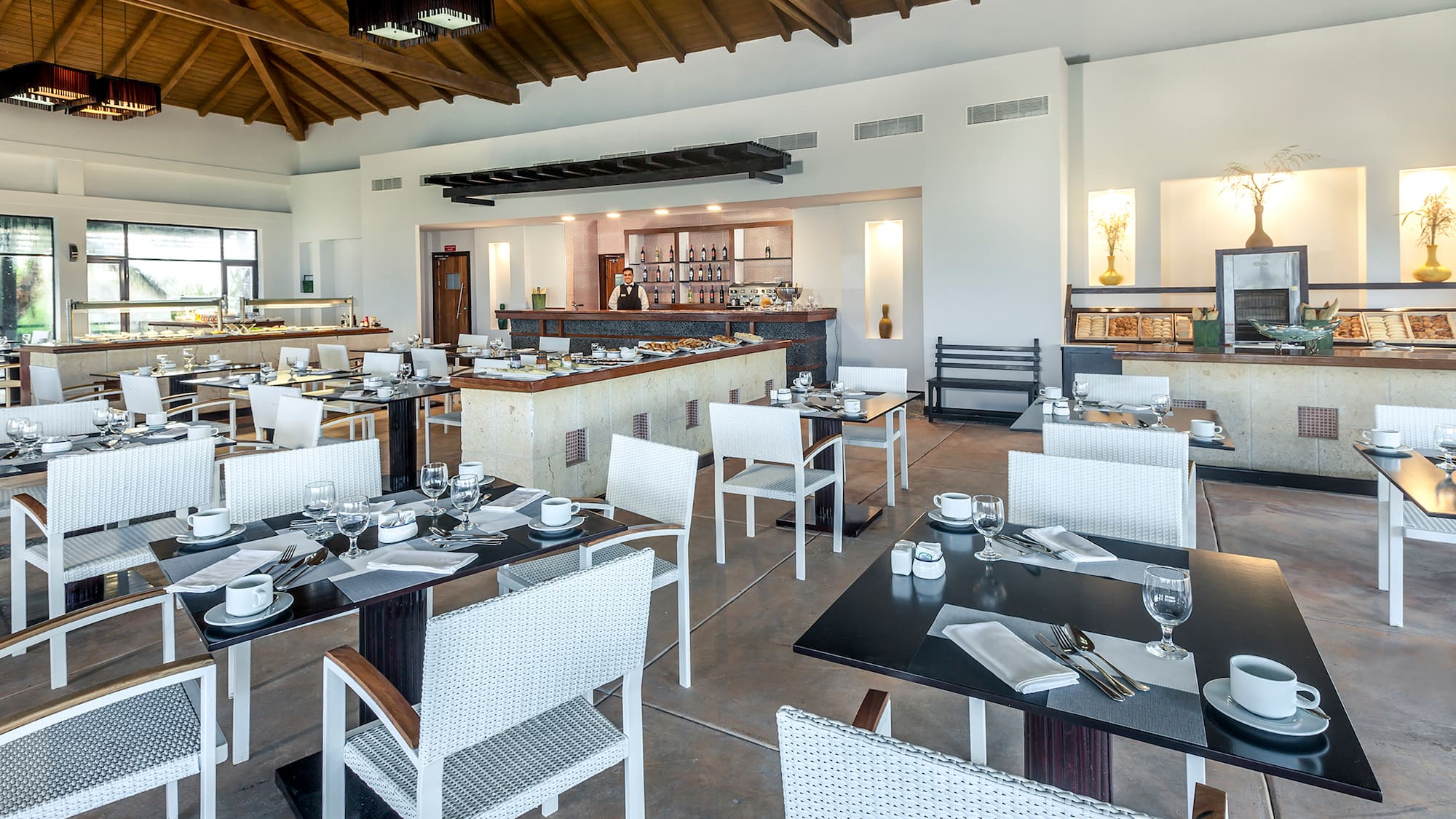 a restaurant with tables and chairs