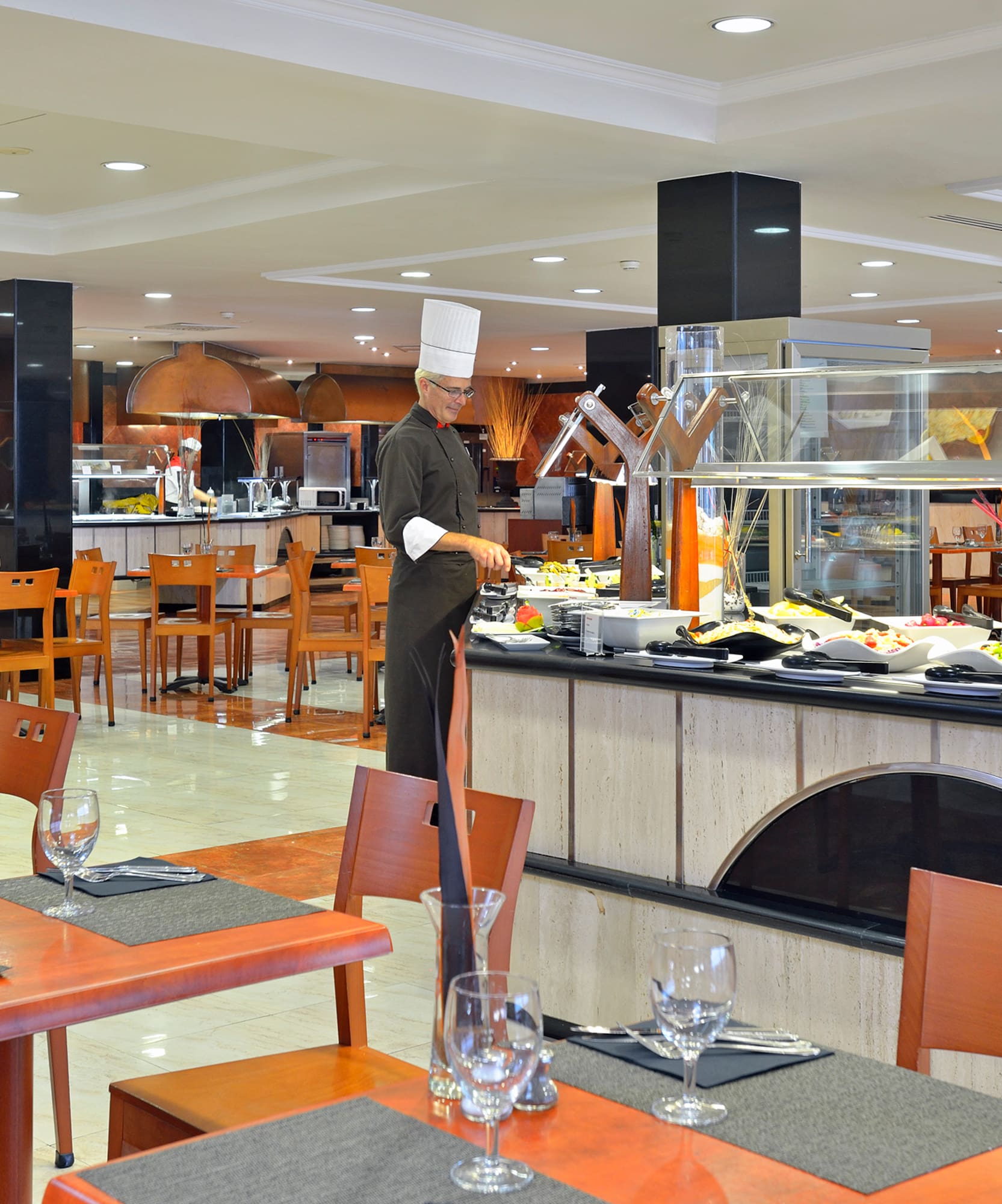 a chef standing in a restaurant