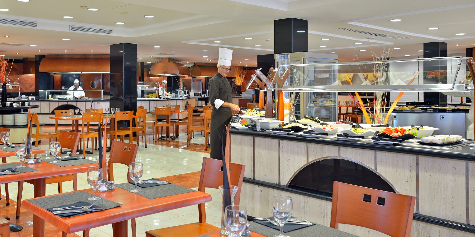a chef standing in a restaurant