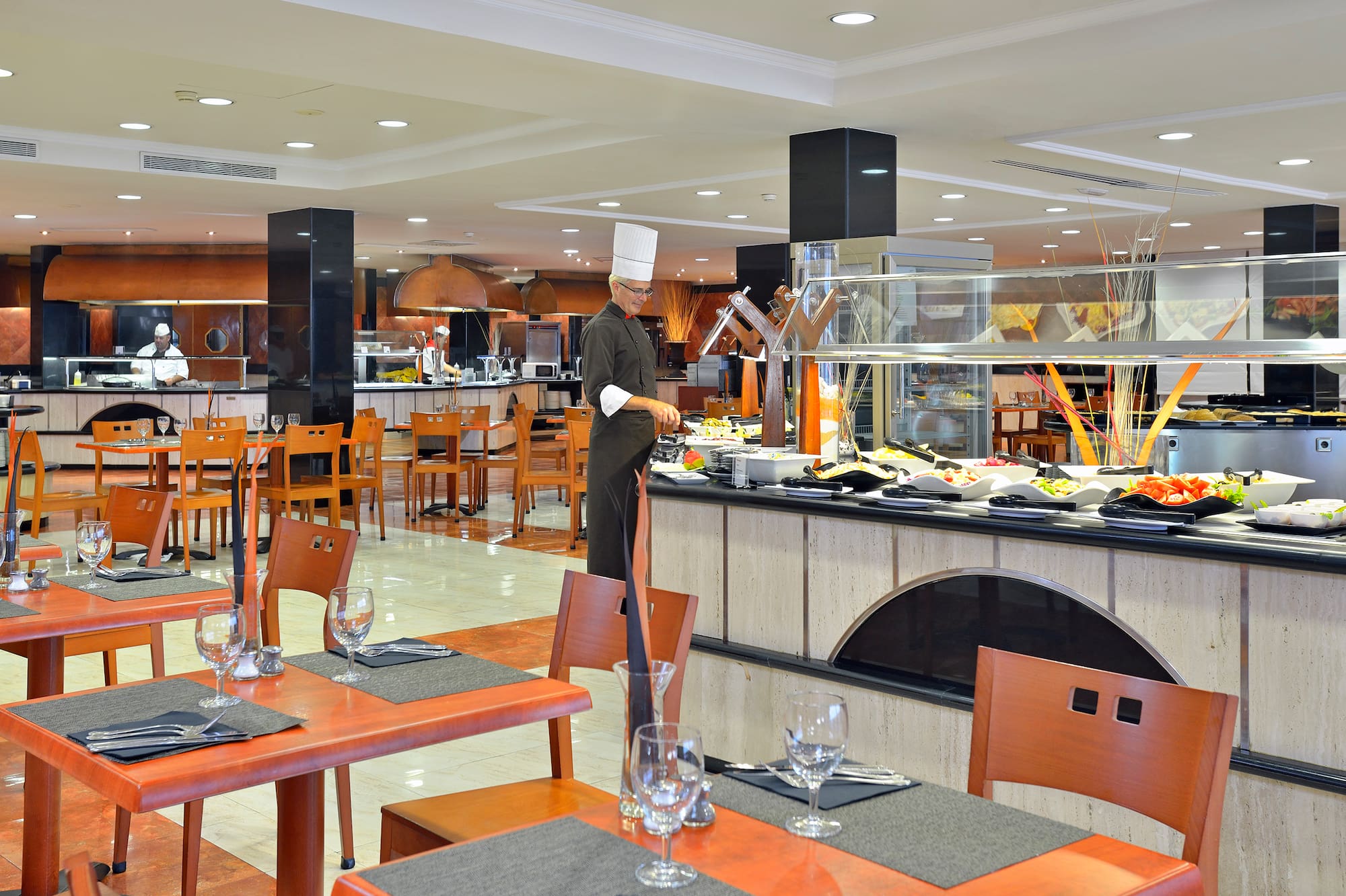 a chef standing in a restaurant