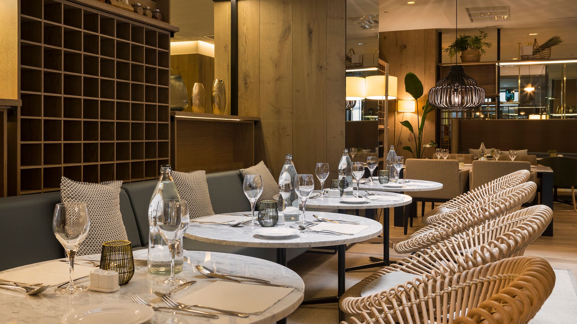 a restaurant with tables and chairs