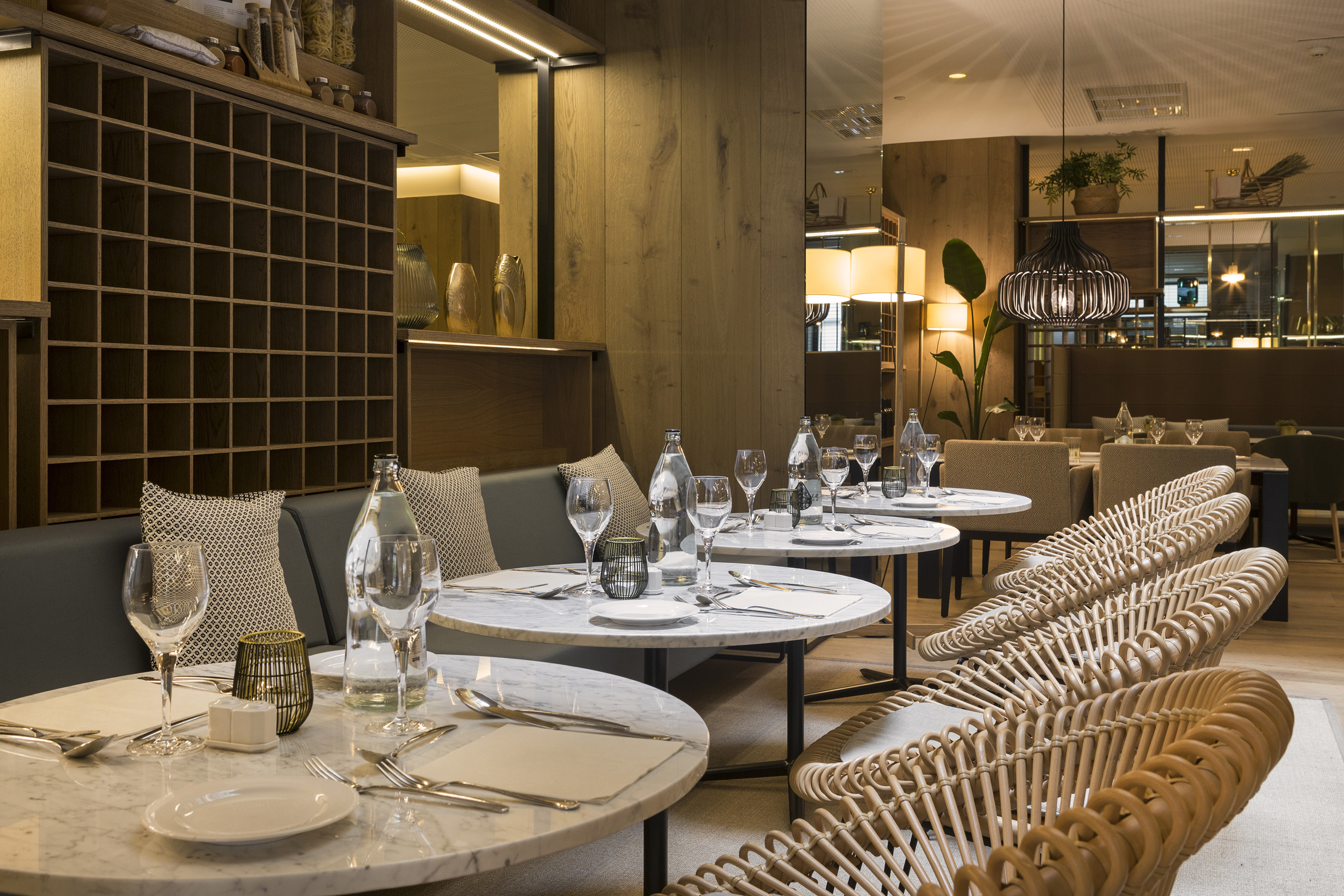 a restaurant with tables and chairs