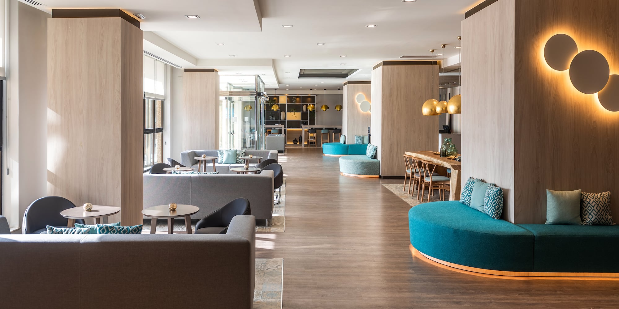 a room with couches and tables