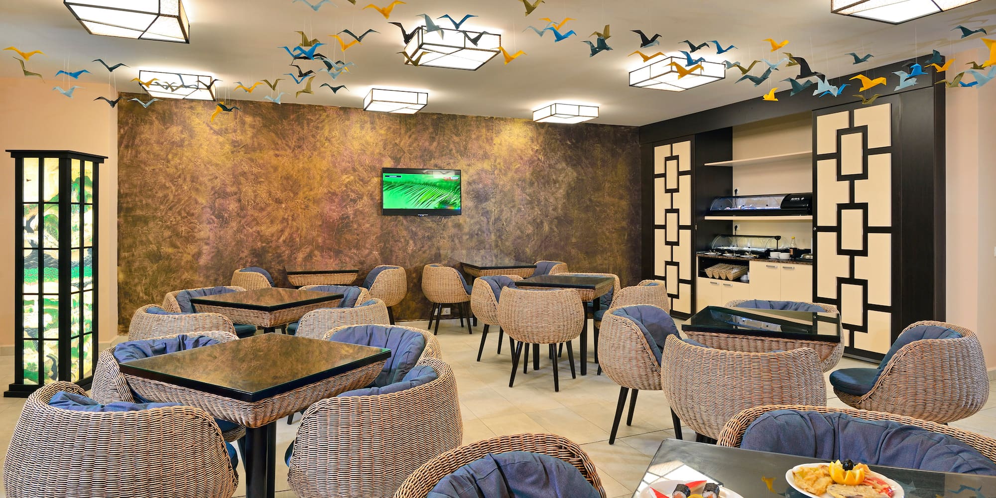 a room with tables and chairs