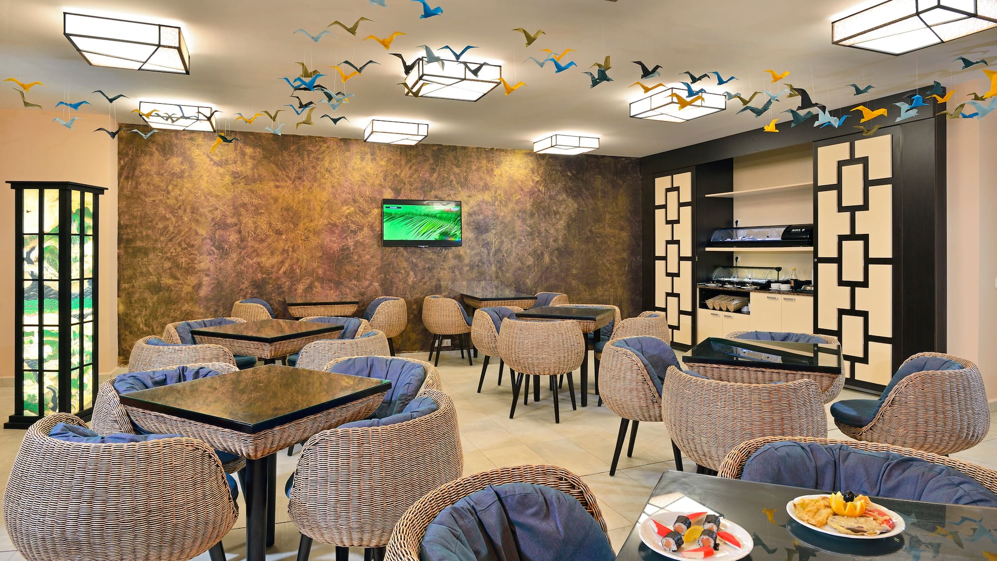 a room with tables and chairs