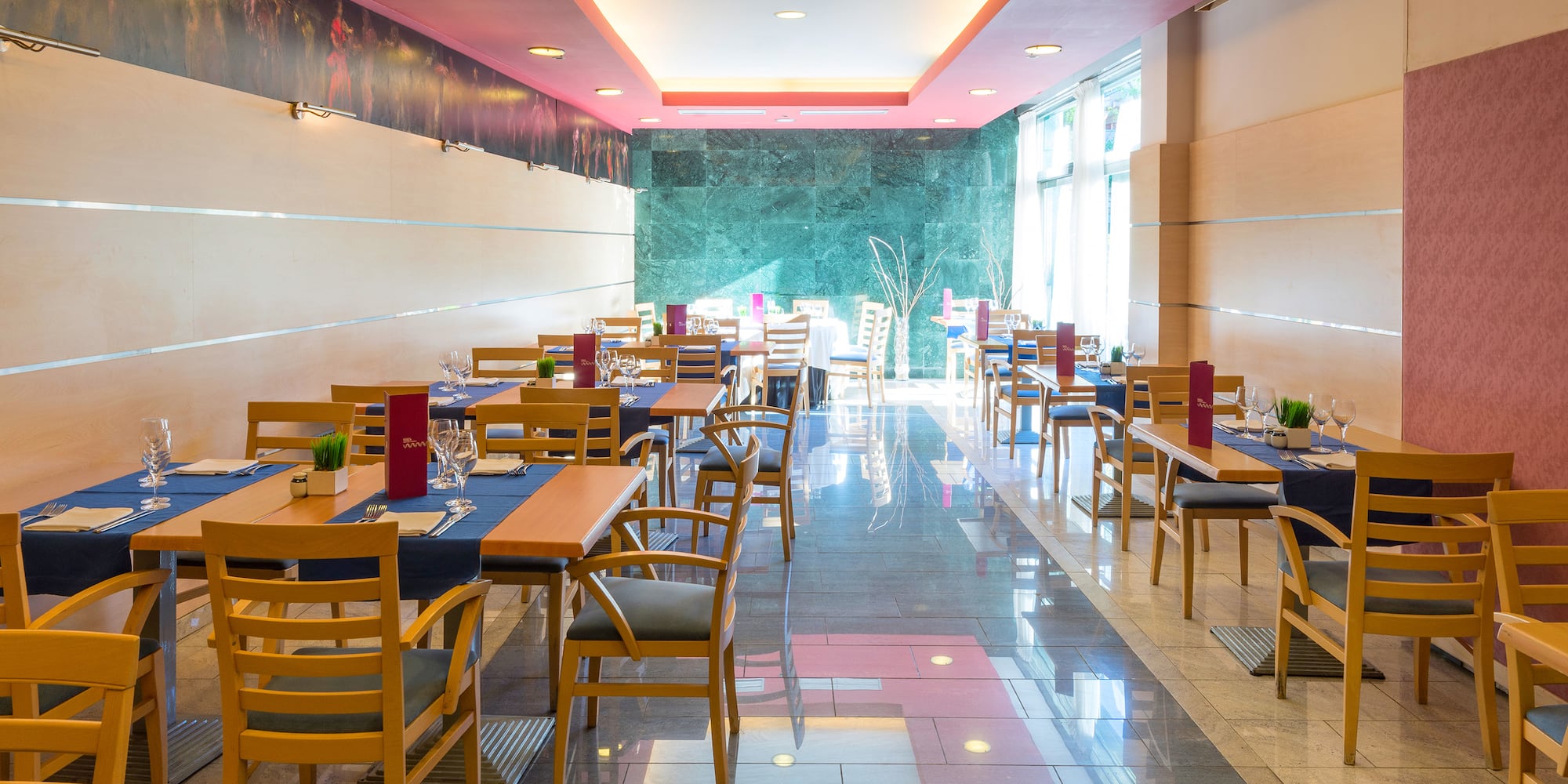 a room with tables and chairs