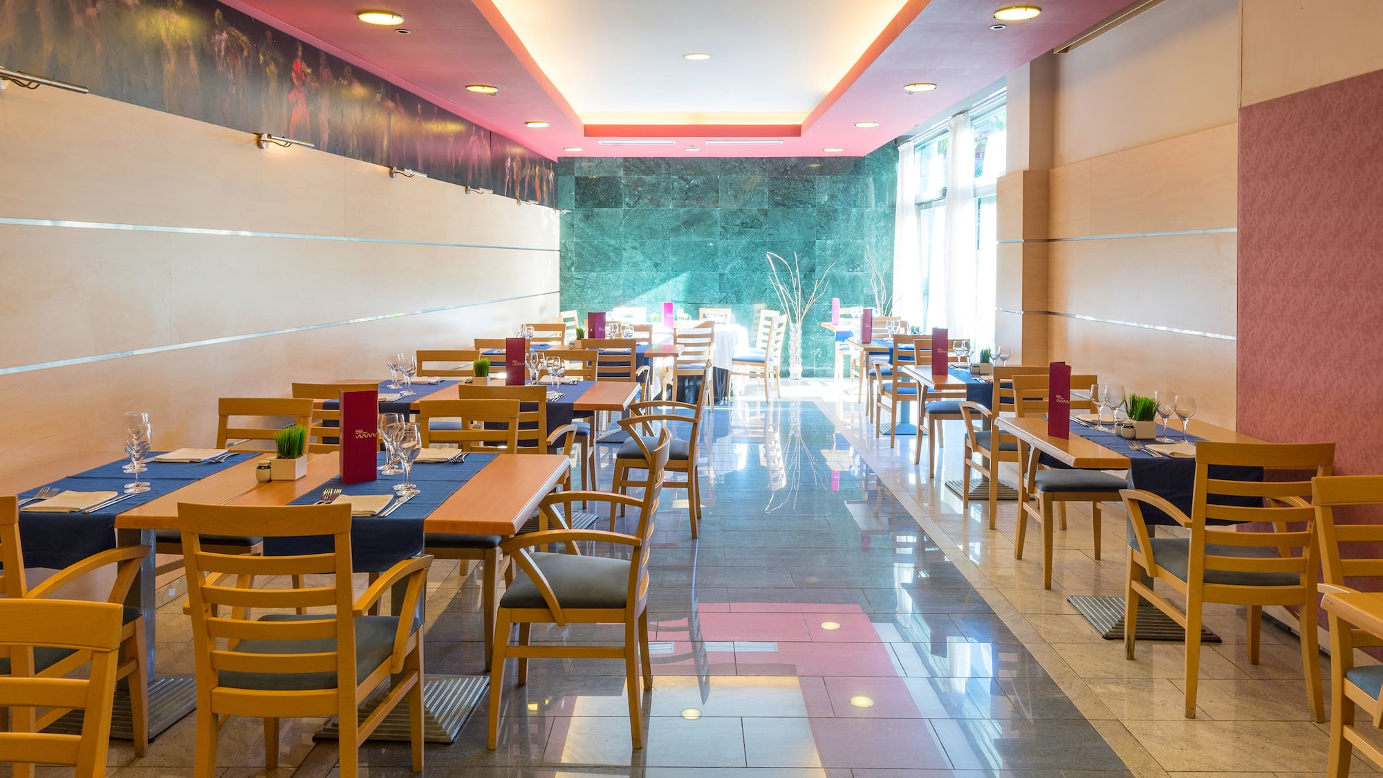 a room with tables and chairs