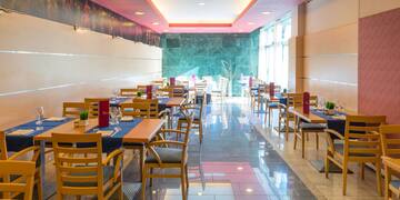 a room with tables and chairs