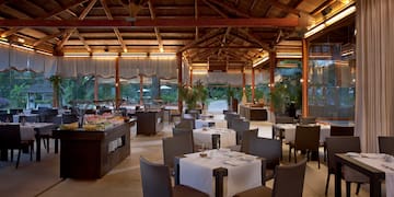 a restaurant with tables and chairs