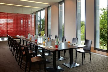 a long table with bottles and glasses on it