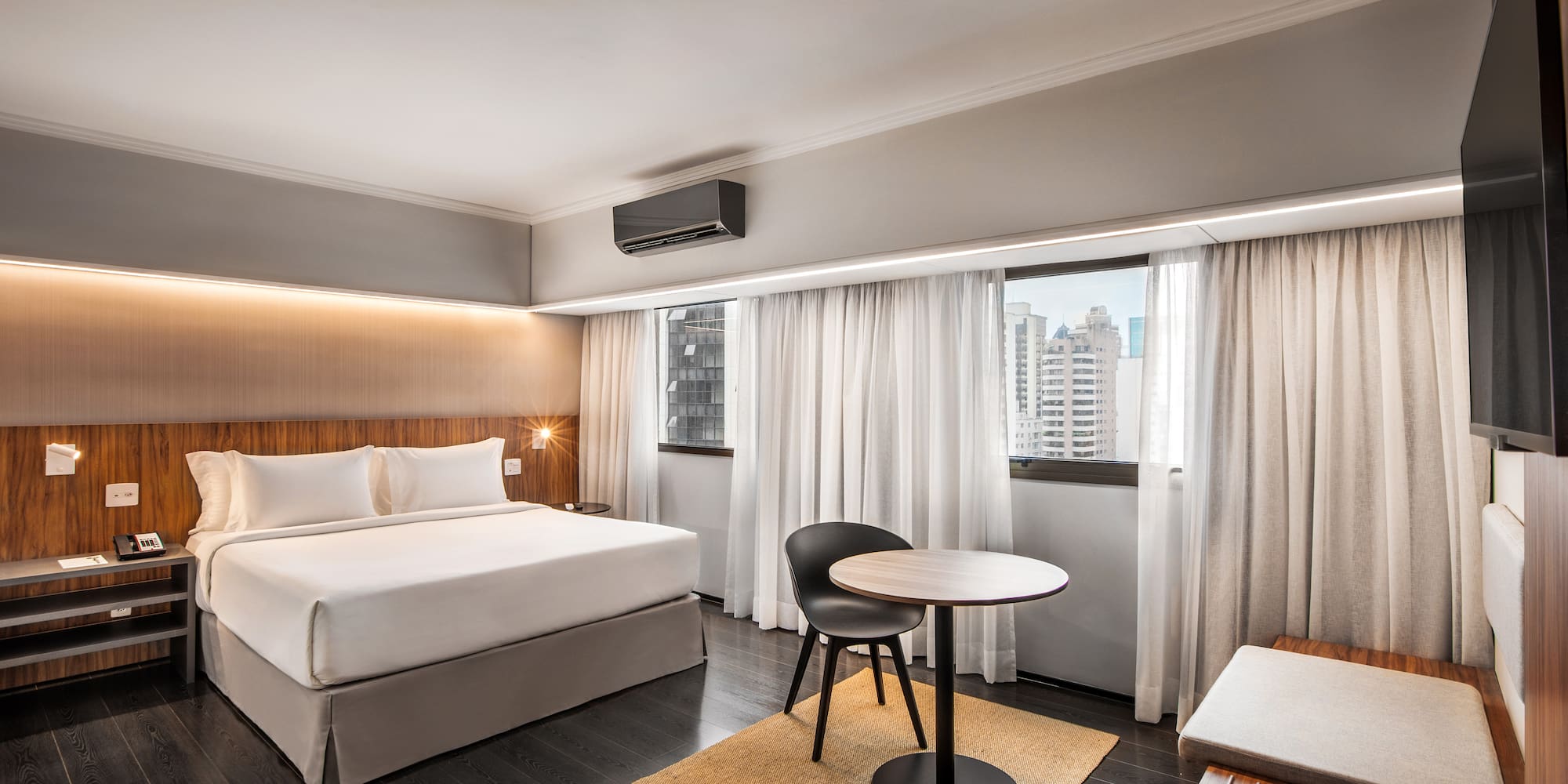 a room with a bed and a table