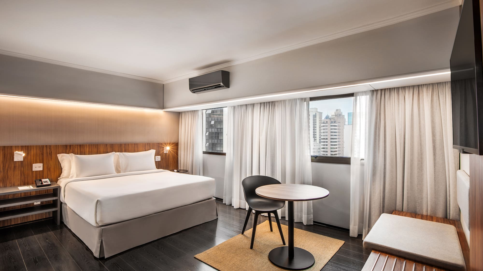 a room with a bed and a table