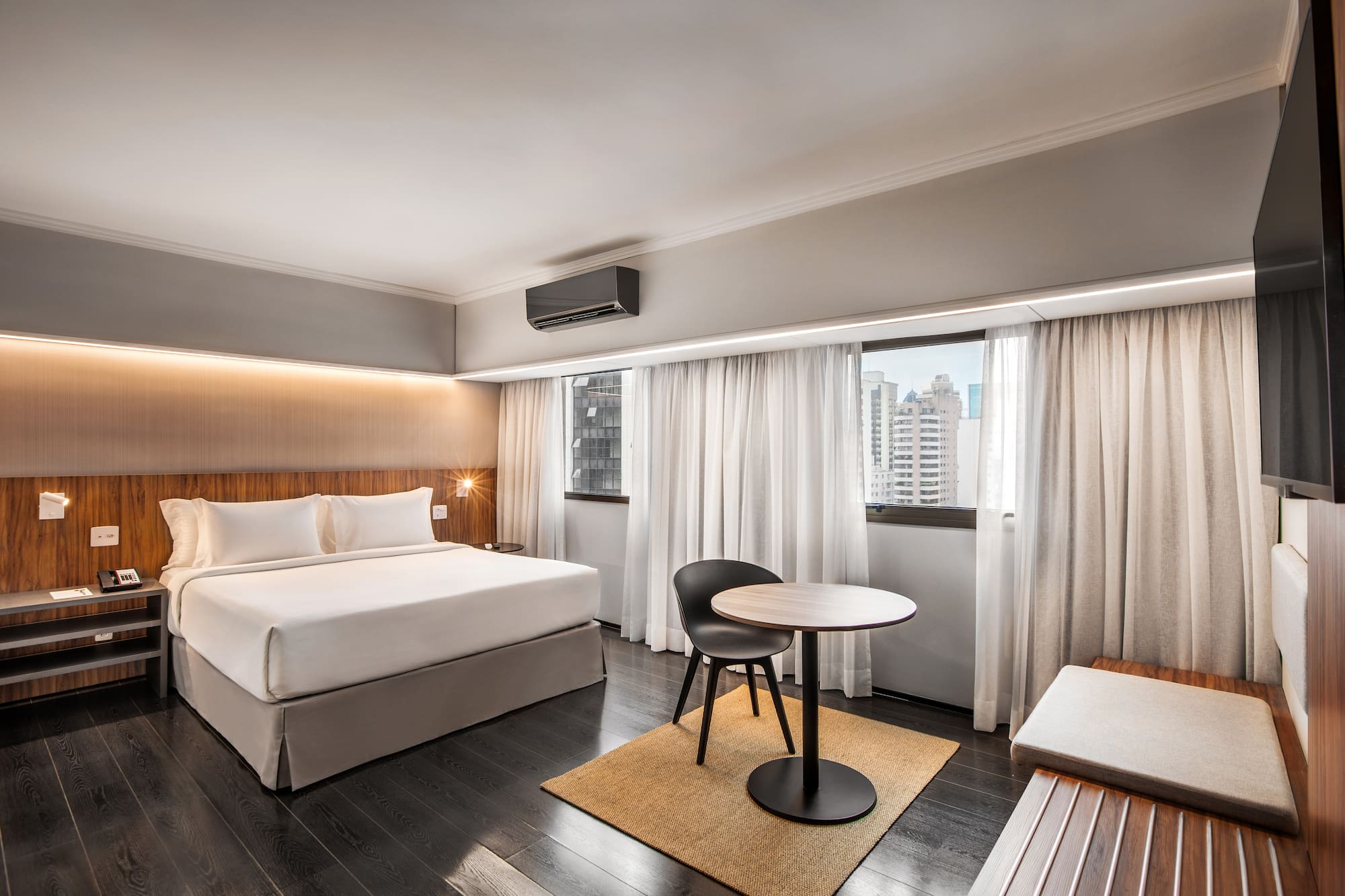 a room with a bed and a table