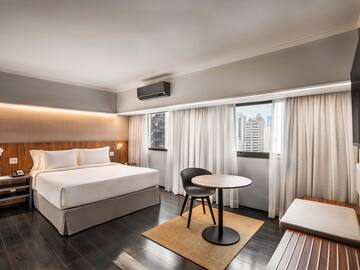 a room with a bed and a table