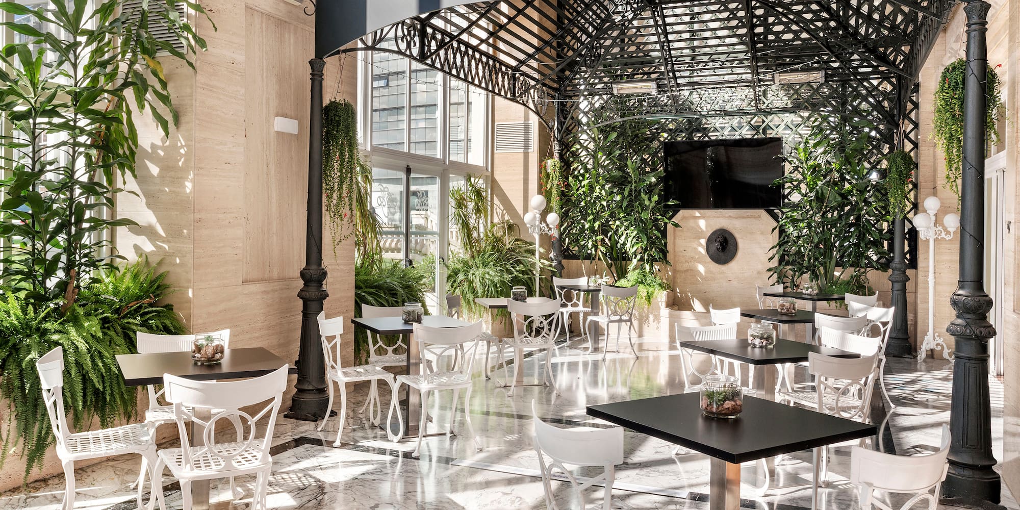 a restaurant with tables and chairs