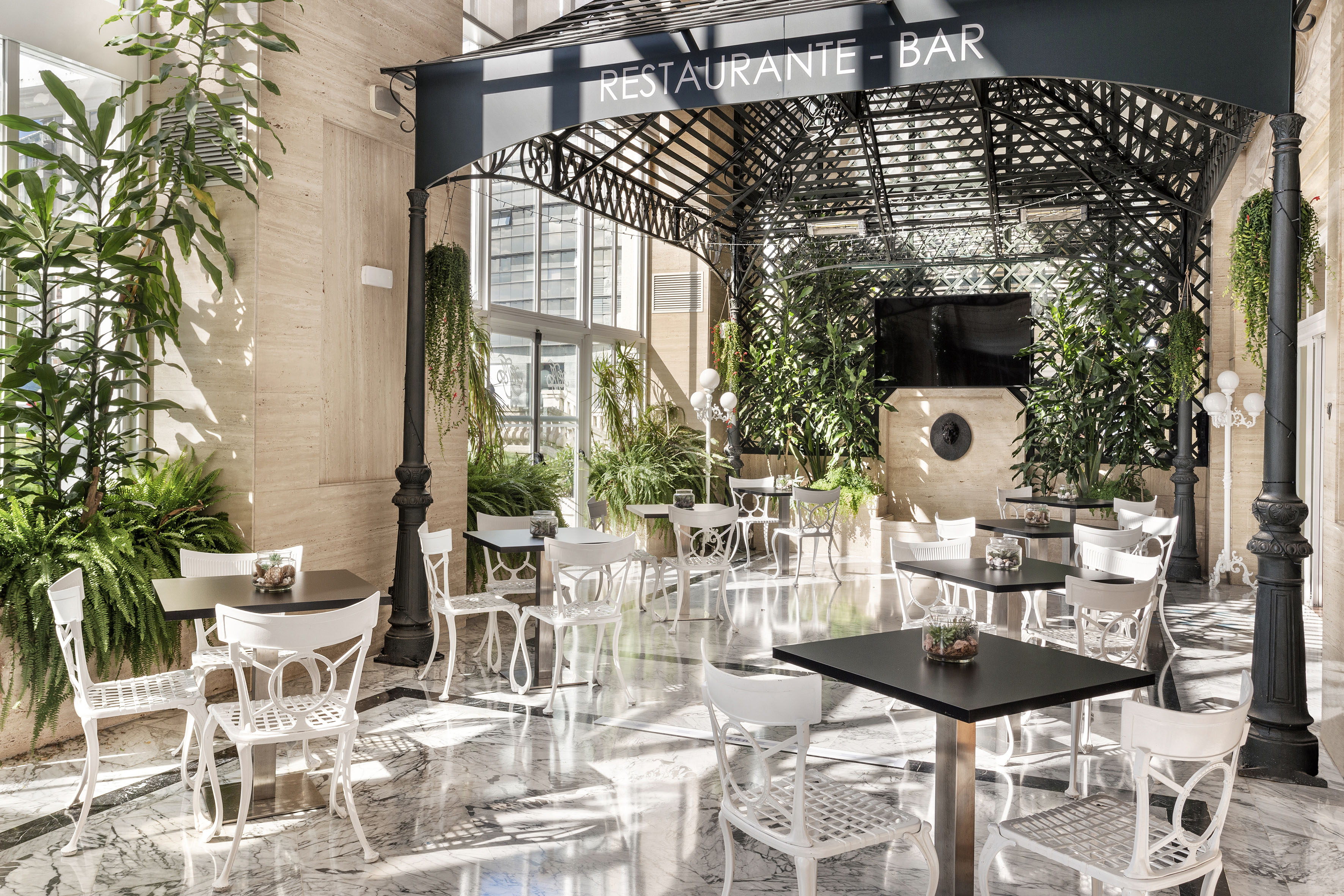 a restaurant with tables and chairs