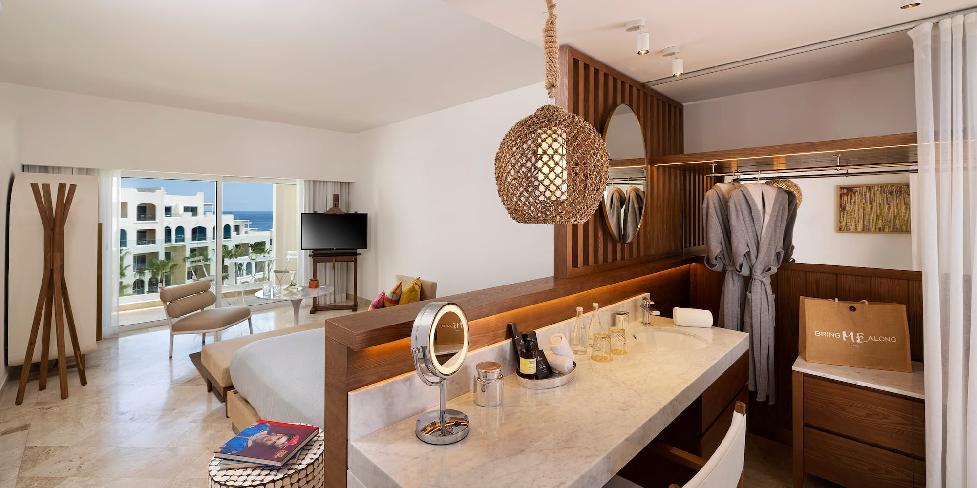 a room with a bed and a mirror