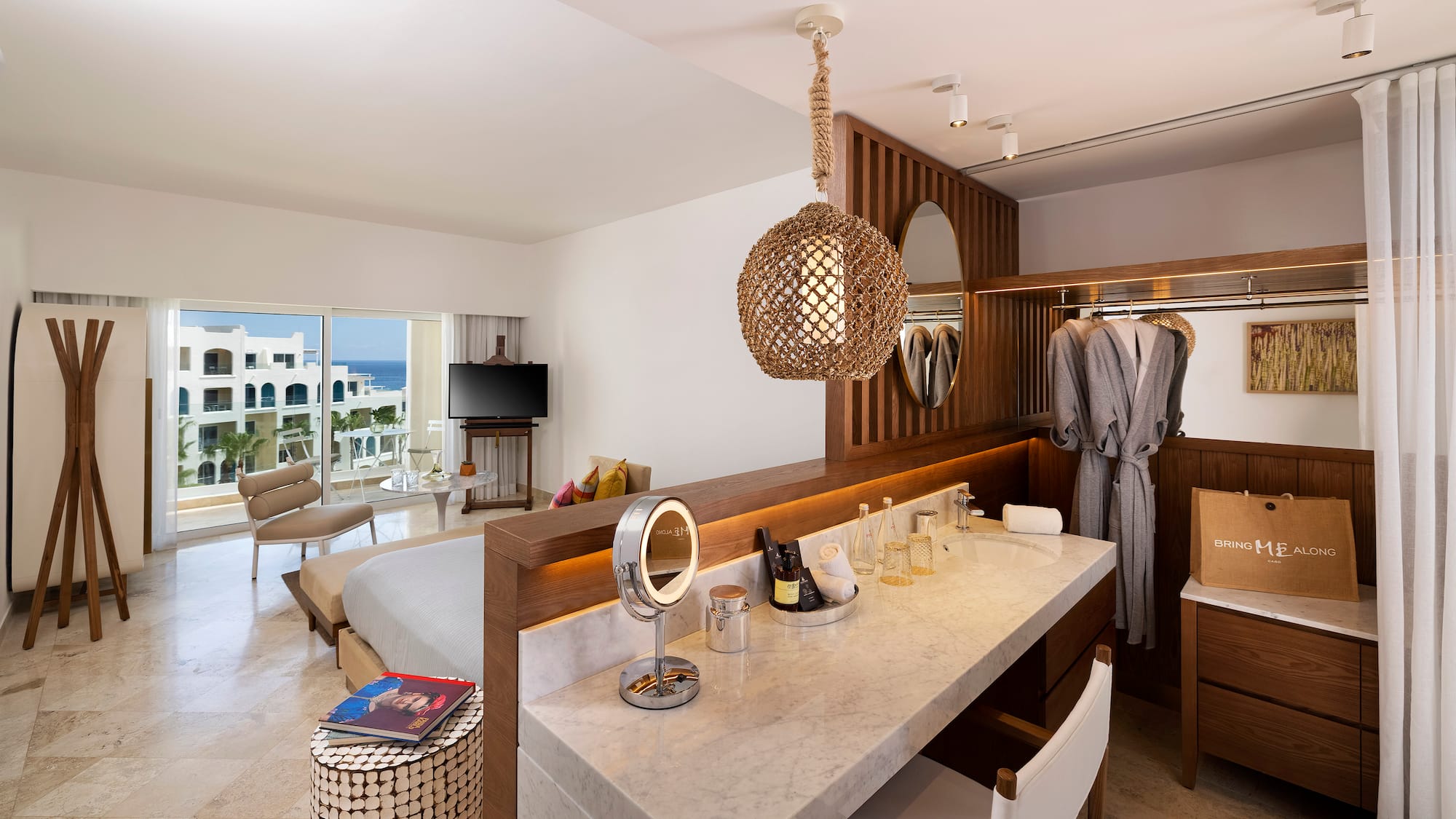 a room with a bed and a mirror