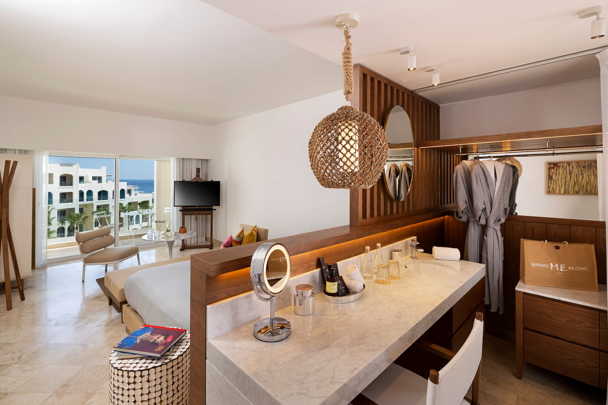 a room with a bed and a mirror