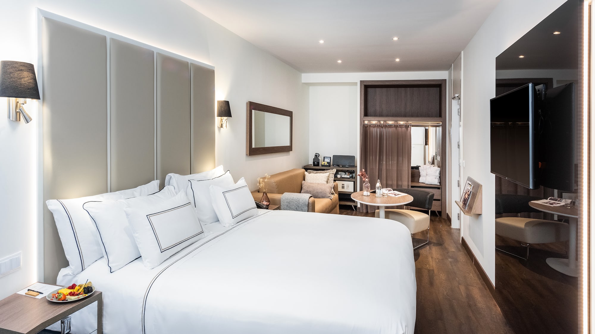 a room with a bed and a table