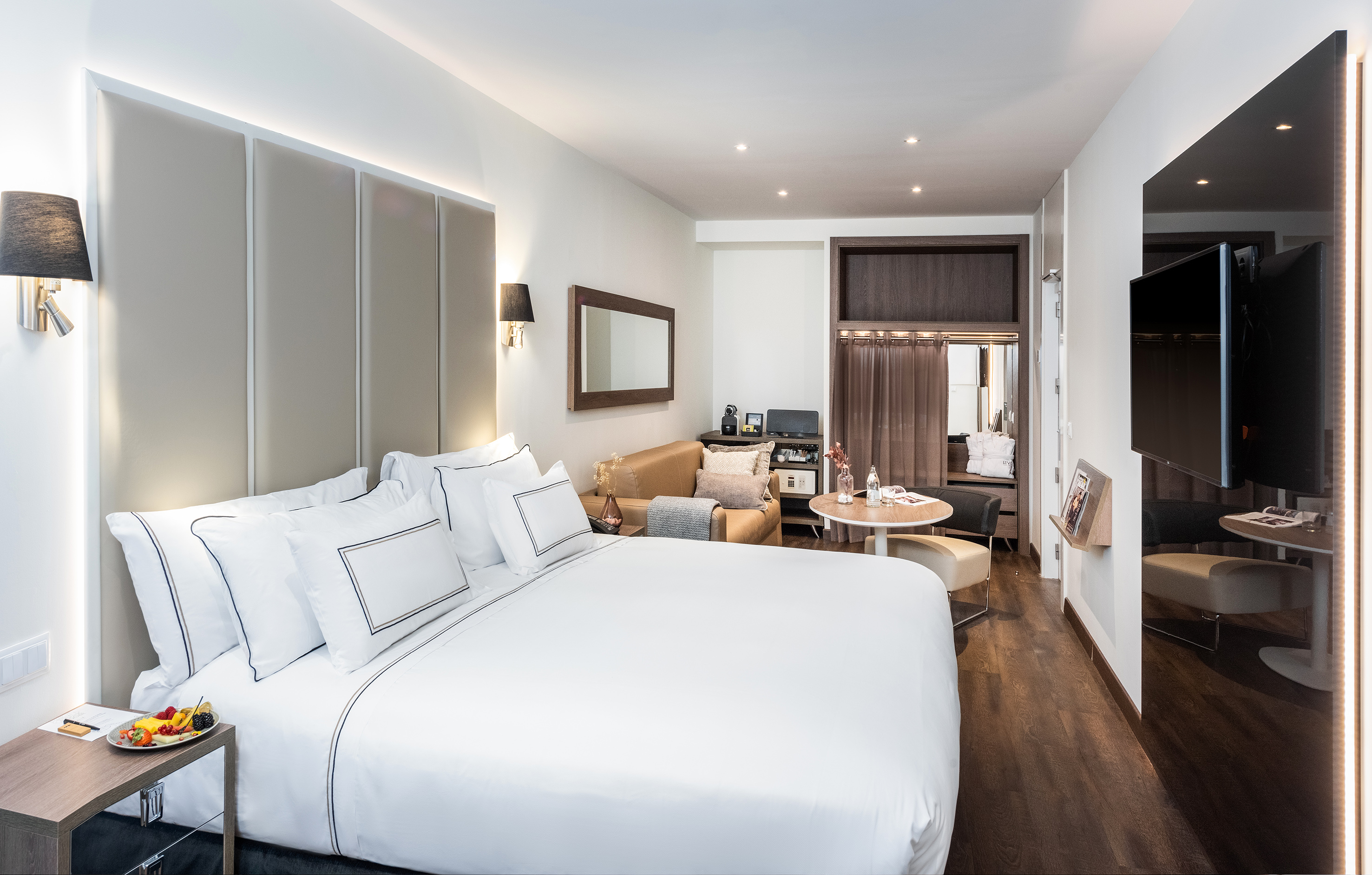 a room with a bed and a table
