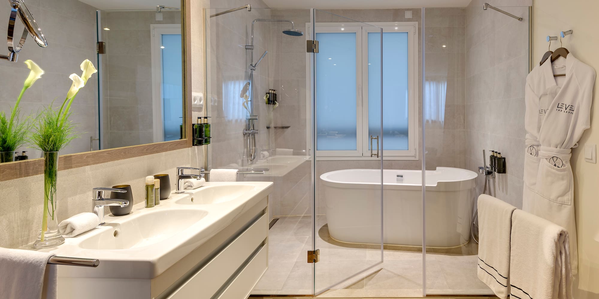 a bathroom with a tub and sink