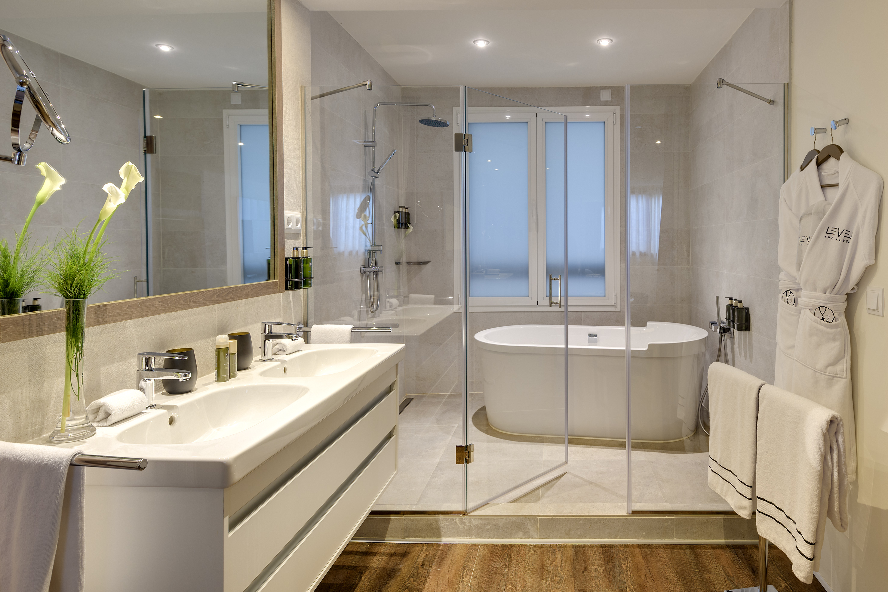 a bathroom with a tub and sink