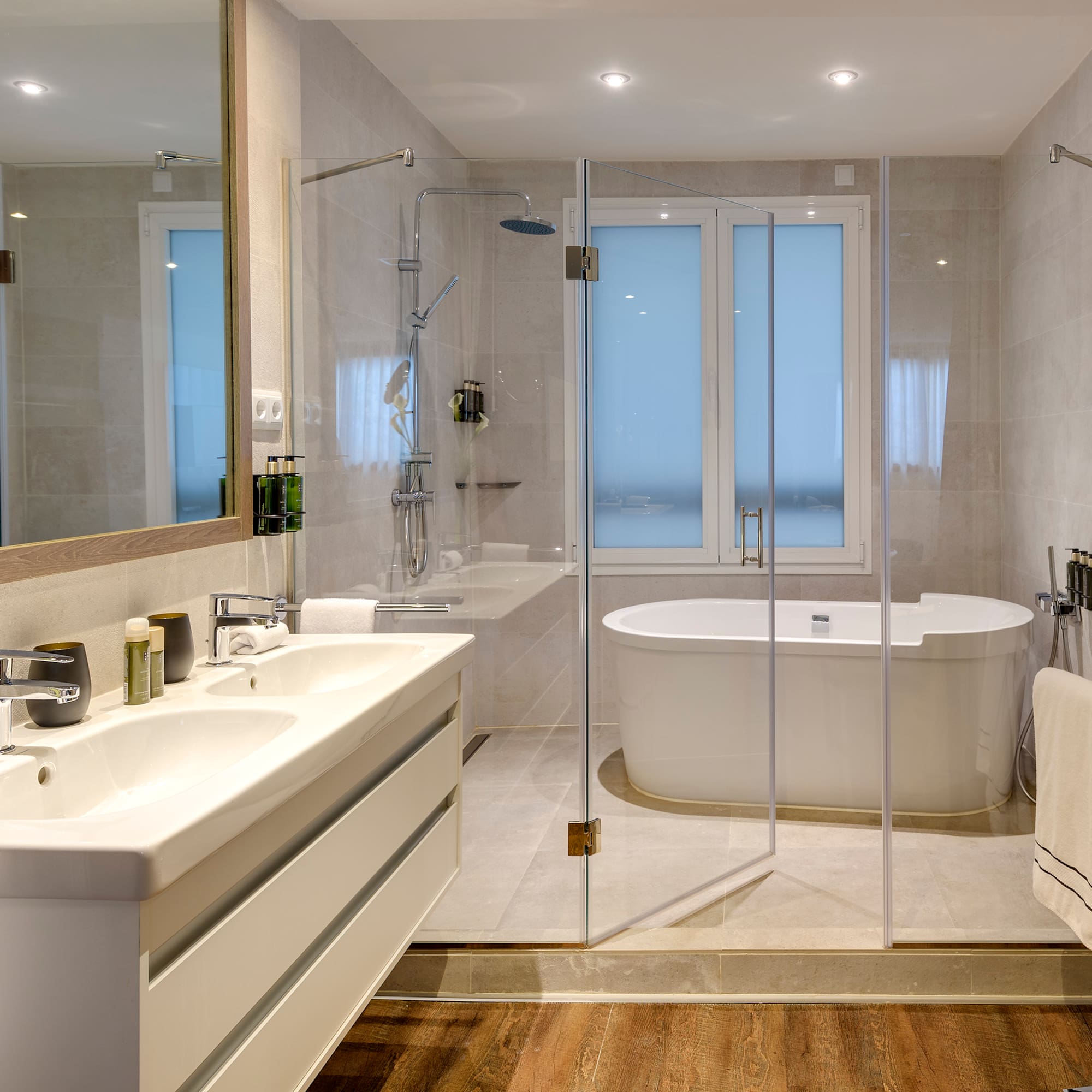 a bathroom with a tub and sink