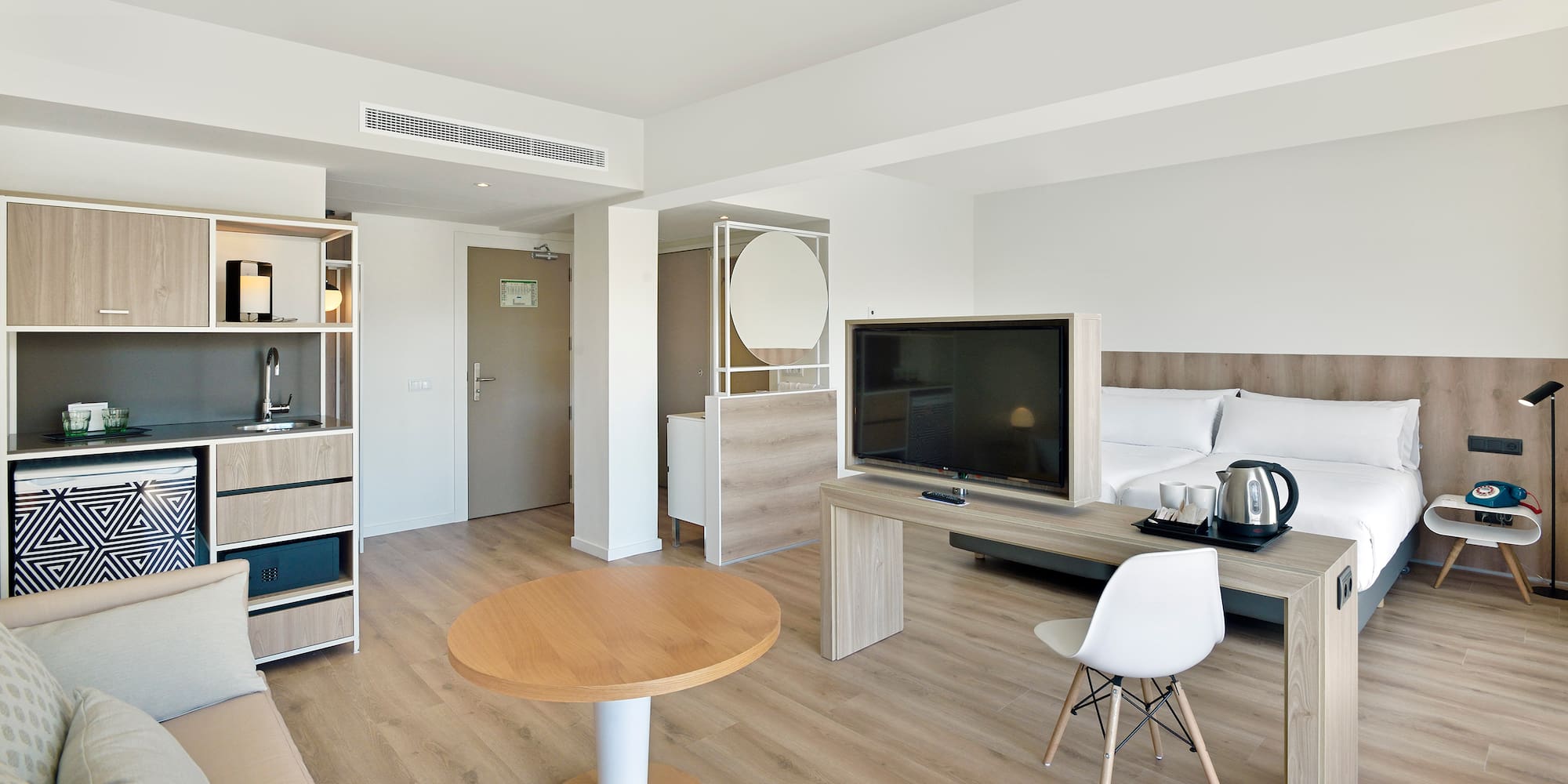 a room with a tv and a table