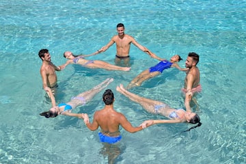 a group of people in a pool