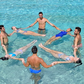 a group of people in a pool