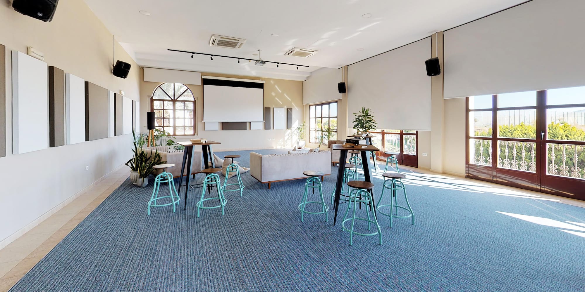 a room with tables and chairs