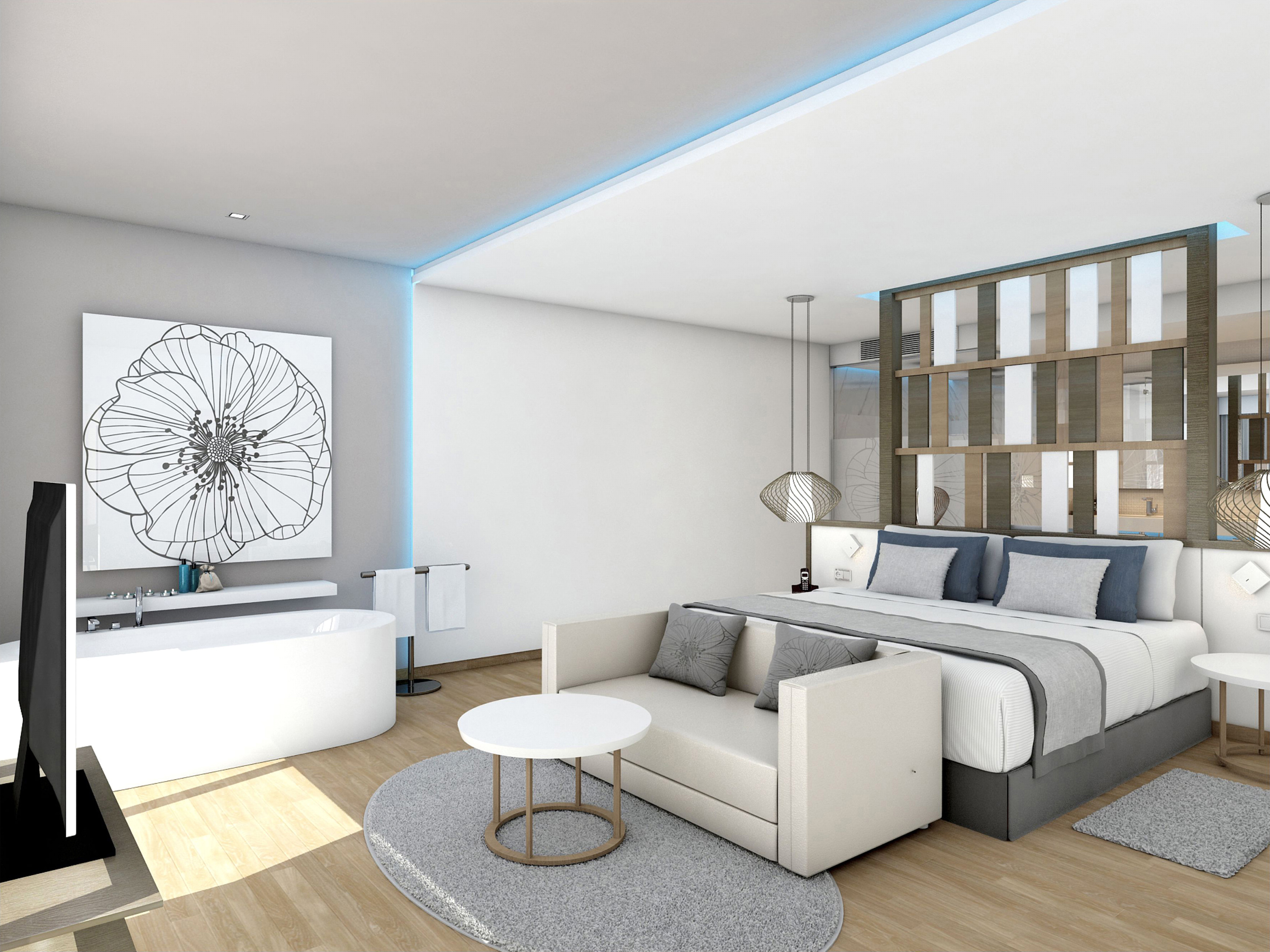 a bedroom with a bed and bathtub