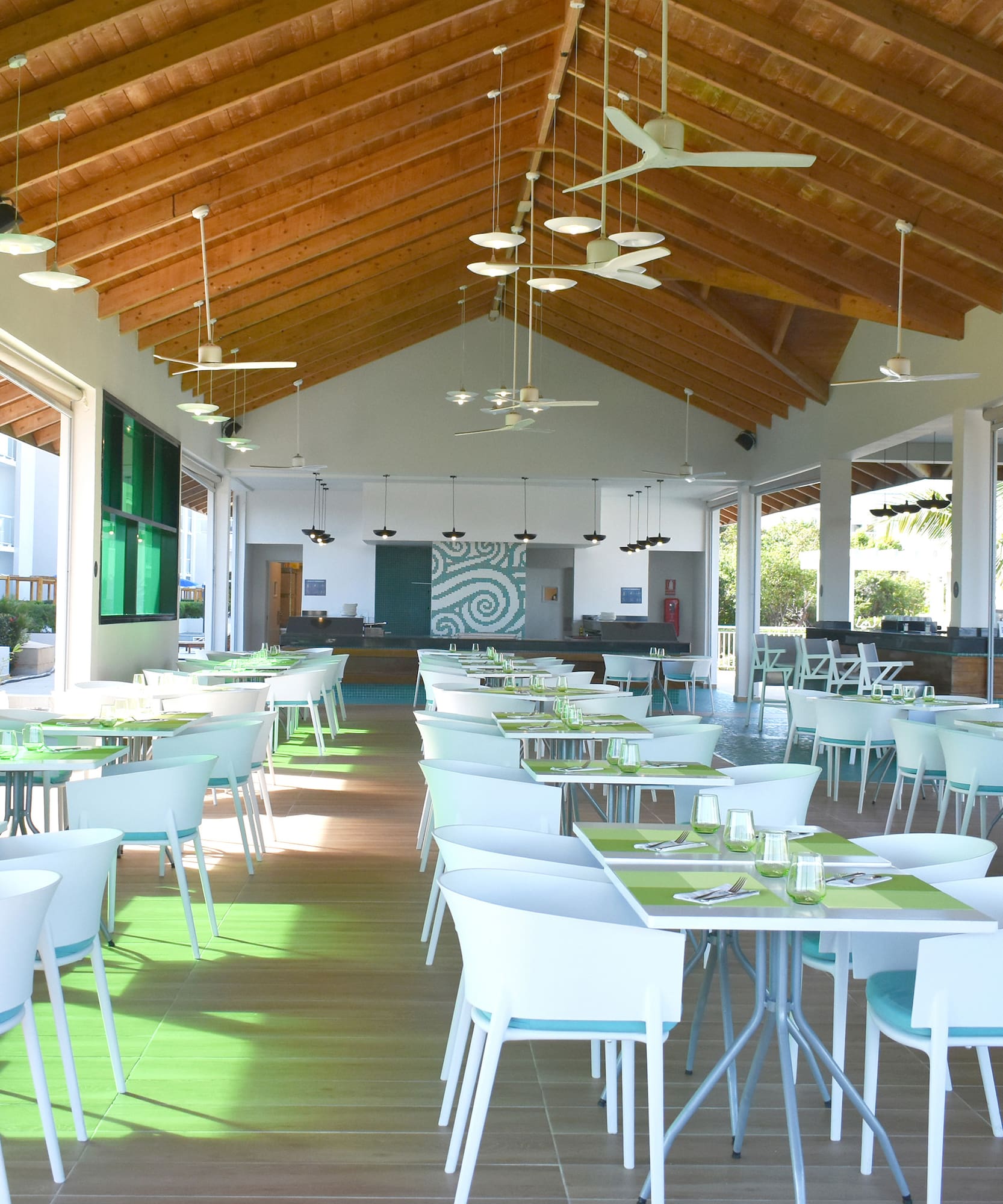 a room with tables and chairs