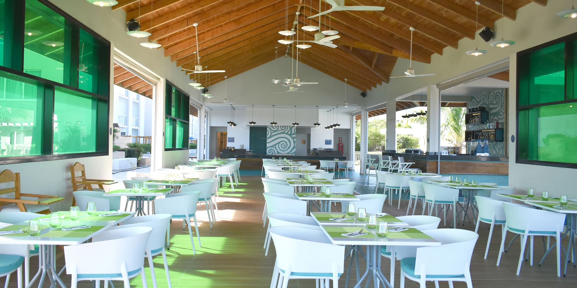 a room with tables and chairs